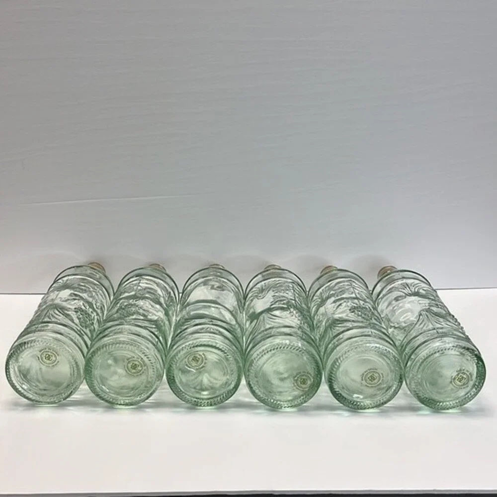 William Sonoma made in Spain Embossed Clear Green Glass Bottles set of 3